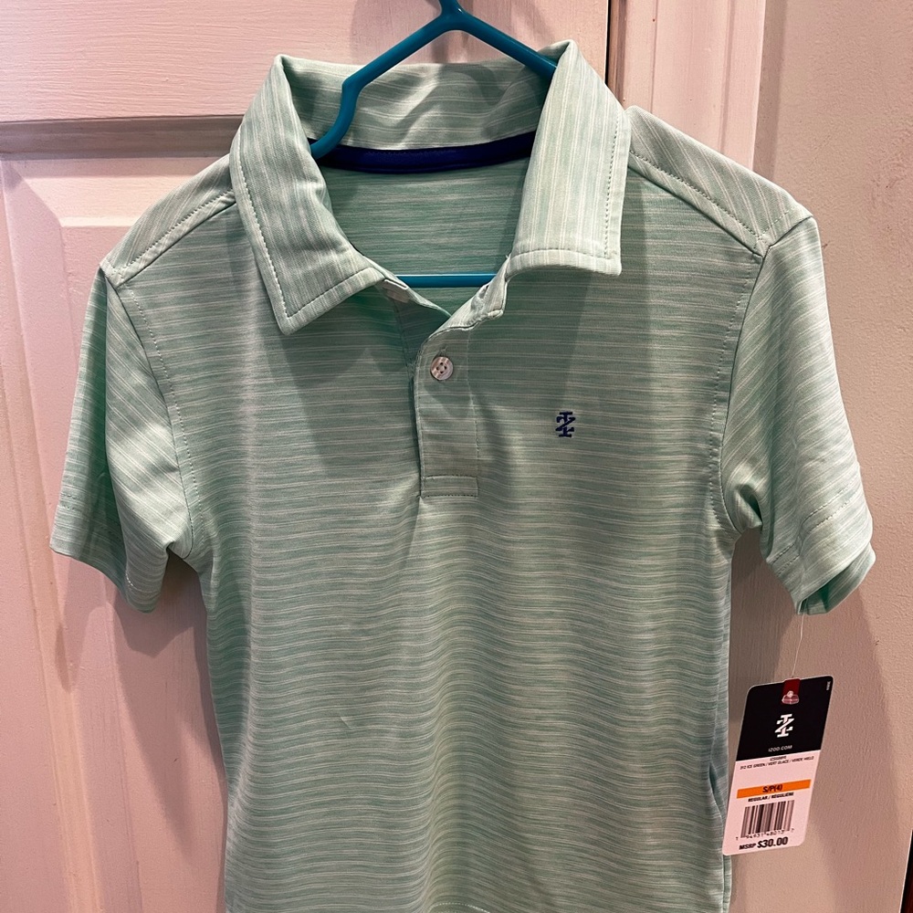 Izod Performance Polo. Sz 4, but fits like a 5.  NWT.  Mint color
